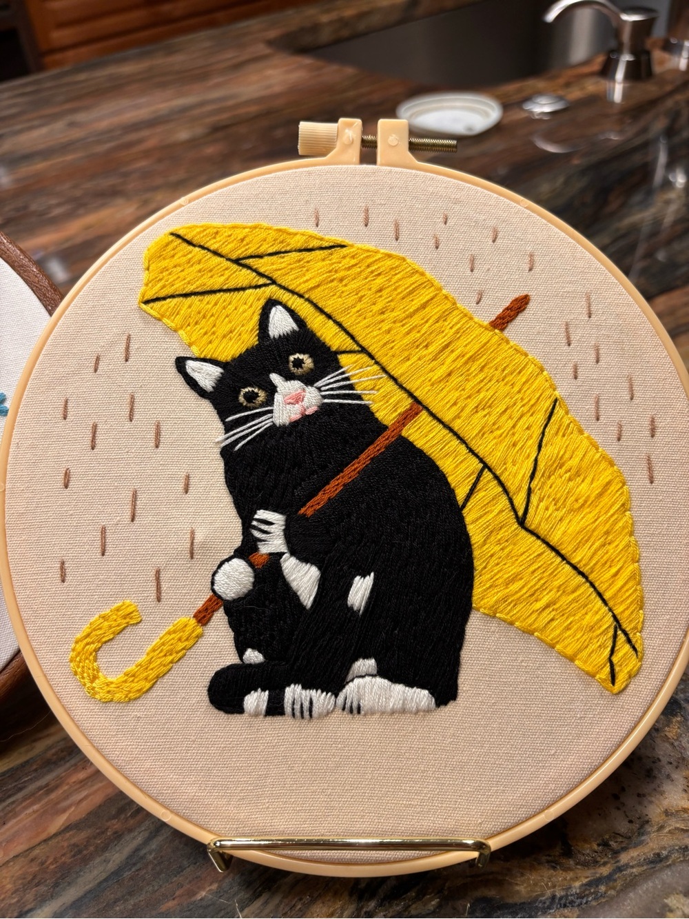 Hand-Embroidered Black Cat with Yellow Umbrella Wall Art